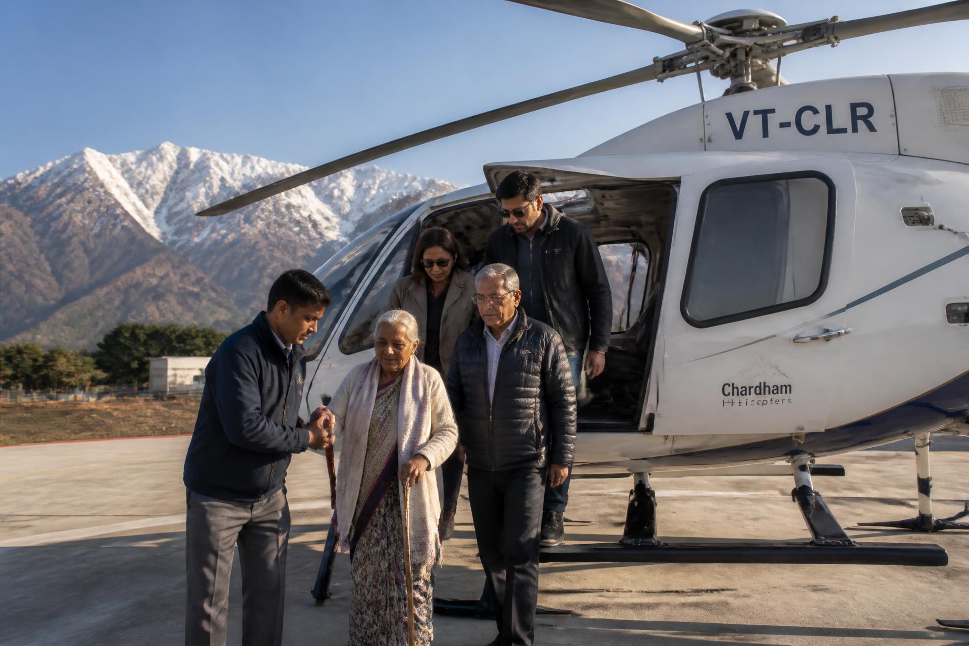A Primero travel representative assisting an Indian senior couple and their family as they step out of a helicopter in the Himalayas